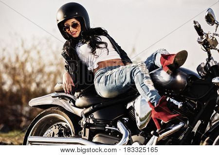 Beautiful Motorcycle Brunette Woman With A Classic Motorcycle (cinema Bleach Bypass Effect)
