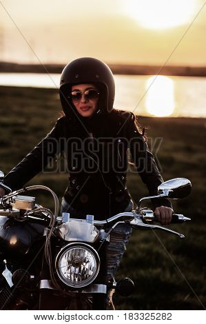 Beautiful Motorcycle Brunette Woman With A Classic Motorcycle (cinema Bleach Bypass Effect)