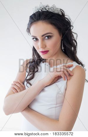 Portrait of bride wedding dress Crown curls hairstyle