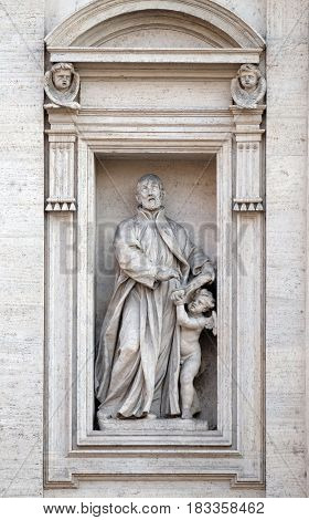 ROME, ITALY - SEPTEMBER 01: Saint Cajetan statue on the portal of Sant Andrea della Valle Church in Rome, Italy on September 01, 2016.