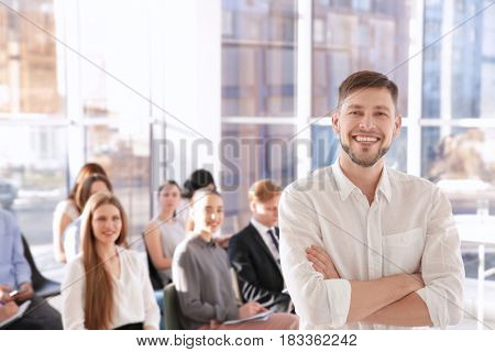Young man at business presentation