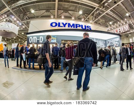 MOSCOW RUSSIA - APRIL 21 2017: Booth of Olympus company at PhotoForum 2017 trade show and exhibition in Moscow Russia on April 21 2017.