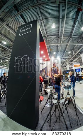 MOSCOW RUSSIA - APRIL 21 2017: Booth of Gitzo company at PhotoForum 2017 trade show and exhibition in Moscow Russia on April 21 2017.