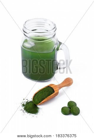 detox healthy lifestyle seaweed organic spirulina and chlorella pills and powder drink isolated on white background