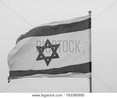 TEL AVIV, ISRAEL. May 6, 2014. Israeli national flag on the Independence day of Israel, black and white photo. Yom Haatzmaut stock image.