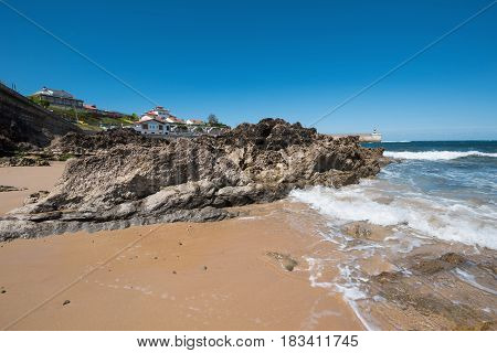 Scenic beach in the touristic village of Comillas Cantabria Spain.