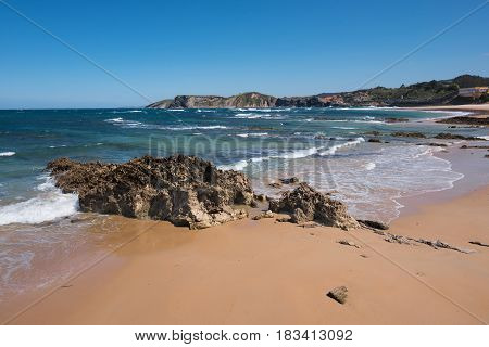 Scenic beach in the touristic village of Comillas Cantabria Spain.