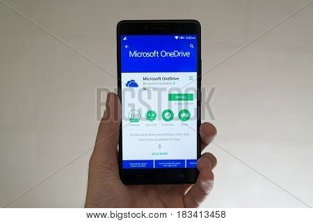 Paris, France, april 22, 2017: Microsoft onedrive application on google play store on smartphone