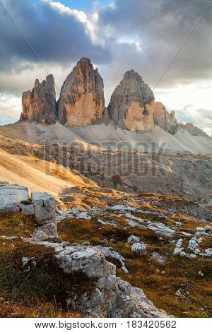 Tre Cime di Lavaredo in beautiful surroundings in the Dolomites at sunset in Italy Europe (Drei Zinnen)