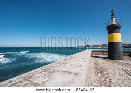 Lighthouse in Comillas port Cantabria Spain .
