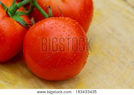 Perfect Fresh Red Wet Tomatoes With Tomato On Background, Very Soft Focus