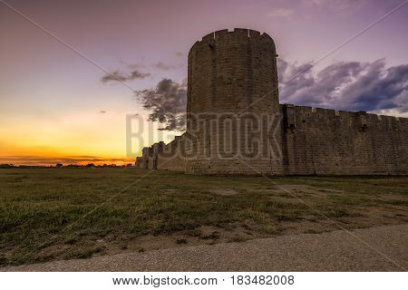 Sunset over the wall in old city Aigues-Mortes, Provence, France.