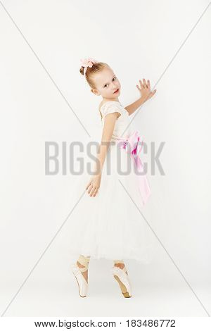 Beautiful Ballet Dancer Isolated On White Background.