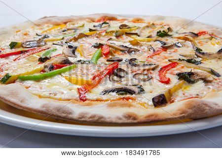 Fresh Pizza With Pepper, Cheese And Mushrooms On White Plate