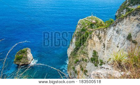 Rock in the ocean at Atuh beach on Nusa Penida island, Indonesia.
