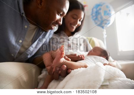 Parents Home From Hospital With Newborn Baby