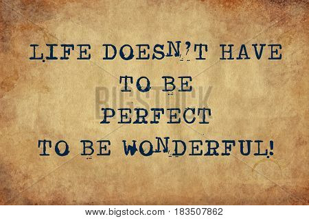 Inspiring motivation quote with typewriter text life doesn't have to be perfect to be wonderful. Distressed Old Paper with Typing image.
