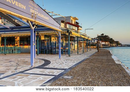 KOKKARI, GREECE - MARCH 24, 2017: Restaurant in Kokkari village on Samos island, Greece on March 24, 2017.