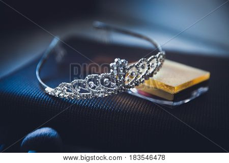 women's tiara of diamonds is on the table
