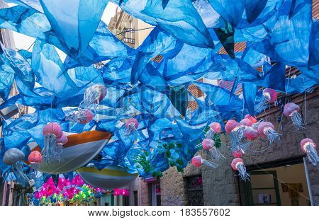Bottom of the sea recreation in neighbourhood festival of Gracia district in Barcelona. The streets are transformed into elaborate creations for the annual neighbourhood festival.