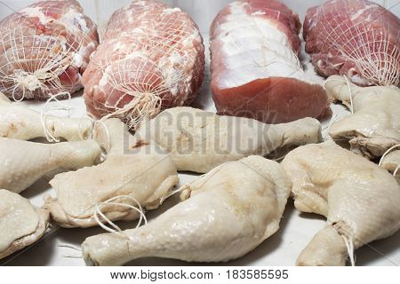 Preparation raw meat for smoking. Pork neck meat and bacon. Preparation of meat for smoking chicken. Meat prepared for smoking