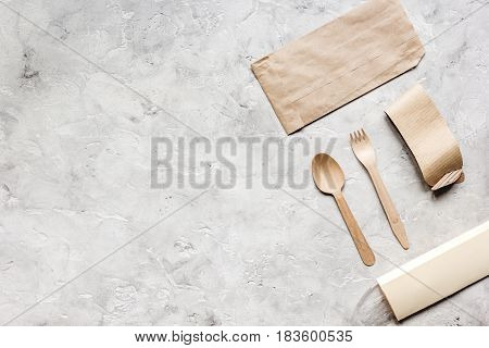 paper bags for food delivery on restourant stone table background top view mockup
