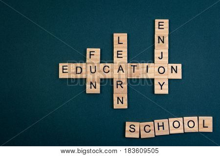 Wood Block Education Word Over Backboard School. Education Word Formed By Educational Wood Block. Ed