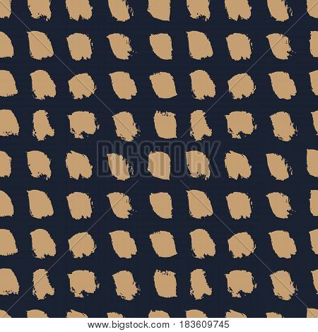 Hand drawn brown brushes on dark blue background. Abstract spotted seamless pattern. Naive minimalistic design. Vector illustration.