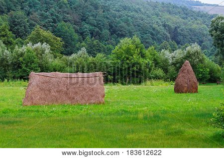 A View From The Ukrainian Carpathian Mountains, Haystacks Behind