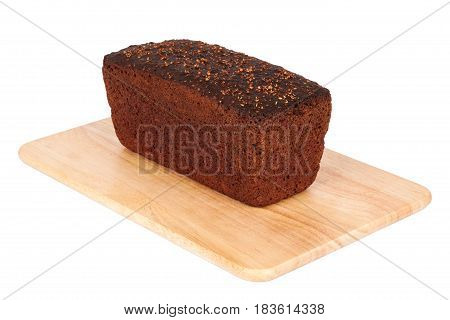Borodinsky bread closeup. Traditional Russian rye-wheat bread with molasses malt and coriander on wooden cutting board isolated on white background