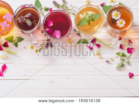 herbal tea on a white wooden background