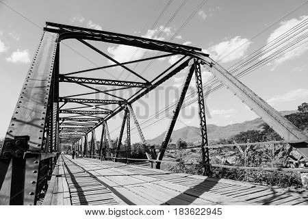 The Memorial Bridge was made of iron and was built in 1942 by the Japanese to transport weapons and provisions to Myanmar during World War II.