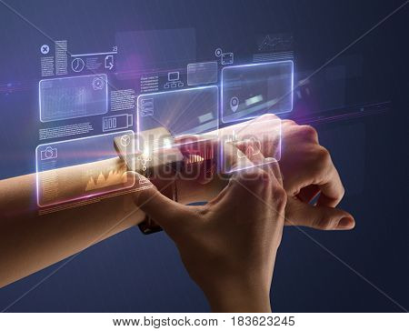 Female hand wearing smartwatch with statement labels around and dark background