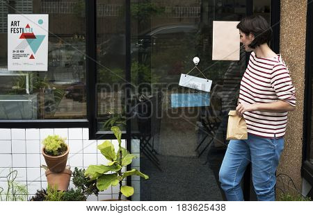 Woman shopping at cafe holiday