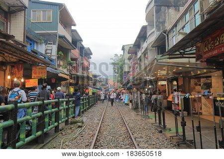 TAIPEI TAIWAN - DECEMBER 5, 2016: Unidentified people visit Shifen town. Shifen is an old railroad town and popular tourist destination.