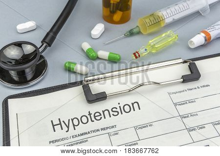 Hypotension medicines and syringes as concept of ordinary treatment health