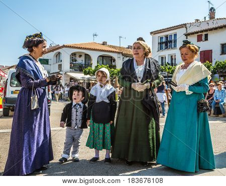 Saint-Marie-de-la-Mer, Provence, France - May 25, 2015. World Festival of Gypsies.  Women and children in fabulously beautiful medieval clothes