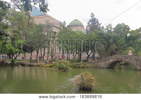 TAIPEI TAIWAN - DECEMBER 7, 2016: Unidentified people visit 228 Peace Park. 228 Peace Park is located in the middle of Taipei downtown.
