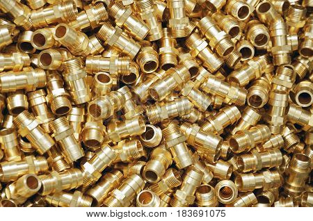background of pile newly made brass fittings