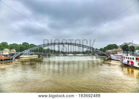 ParisFrance - June 5 2016: Paris cityscape with the River Seine and Austerlitz Bridge during the massive flooding in Paris in the first days of June 2016.