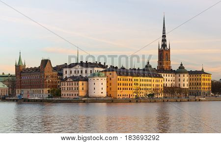 Stockholm - October 2014, Sweden: Evening cityscape of the historic city center in Stockholm and Riddarholm Church (Gamla Stan)