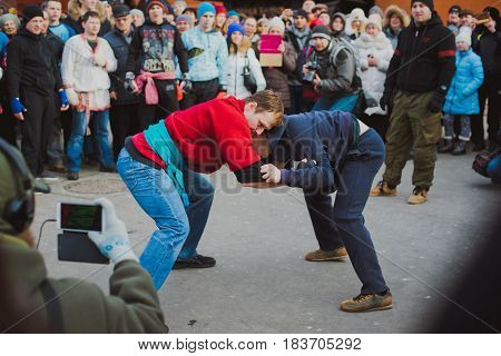 Russia. Moscow. Red Square. February 26, 2017. mass brawl of hooligans and fans in the center of Moscow. Street Fight
