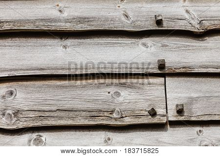 Textures patterns and backgrounds concept. Light old wooden wall detail board closeup