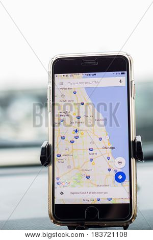 Chicago,IL,USA,Feb-21,2017,Smartphone attached to a car mount in car with Google map
(for editorial use only)