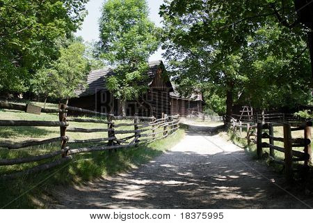 An old historic houses in museum  â Roznov  Skansen -  Wallachian Village open air museum- in Czech republic in Europe under mountains by name Beskydy