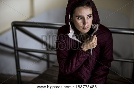 Cold Hopeless Woman Sitting Thoughtful