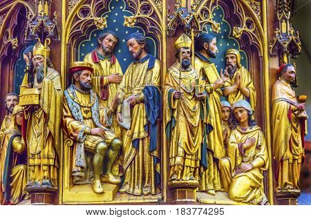 AMSTERDAM, NETHERLANDS - MARCH 30, 2017 Altar Wooden Church Figures Bishops Kings De Krijtberg Church Amsterdam Holland Netherlands.