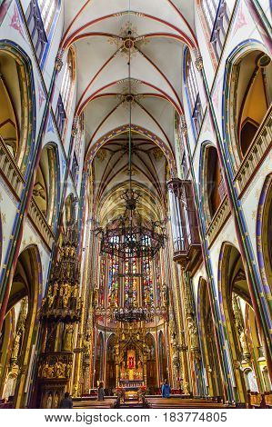 AMSTERDAM, NETHERLANDS - MARCH 30, 2017 Basilica Christ Crucifix Stained Glass De Krijtberg Church Amsterdam Holland Netherlands. Roman Catholic Church built in 1883 maybe the most beautiful church in Amsterdam.