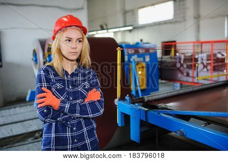 Beautiful Woman In Red Safety Helmet Work As Industrial Worker