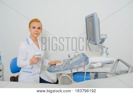 Doctor Working At Ultrasound Diagnostic Machine